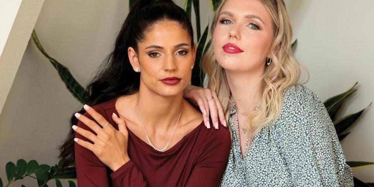 Two women wearing stylish ewellery and casual outfits, showcasing rings and necklaces