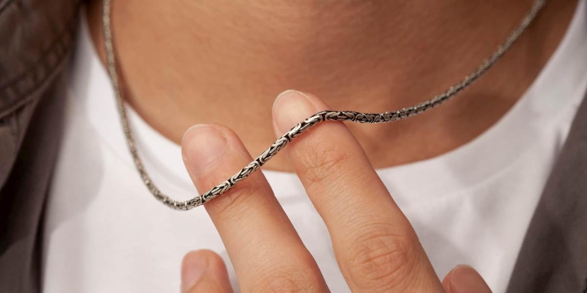 Picture of a men with a chain necklace